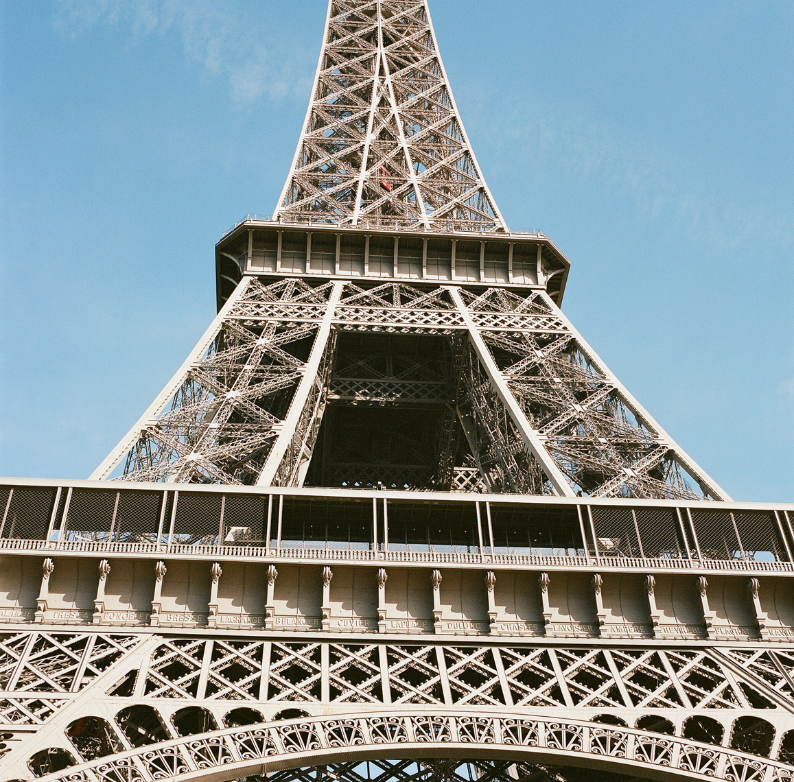 Eiffel Tower looking up blue sky Paris film photography square format travel editorial