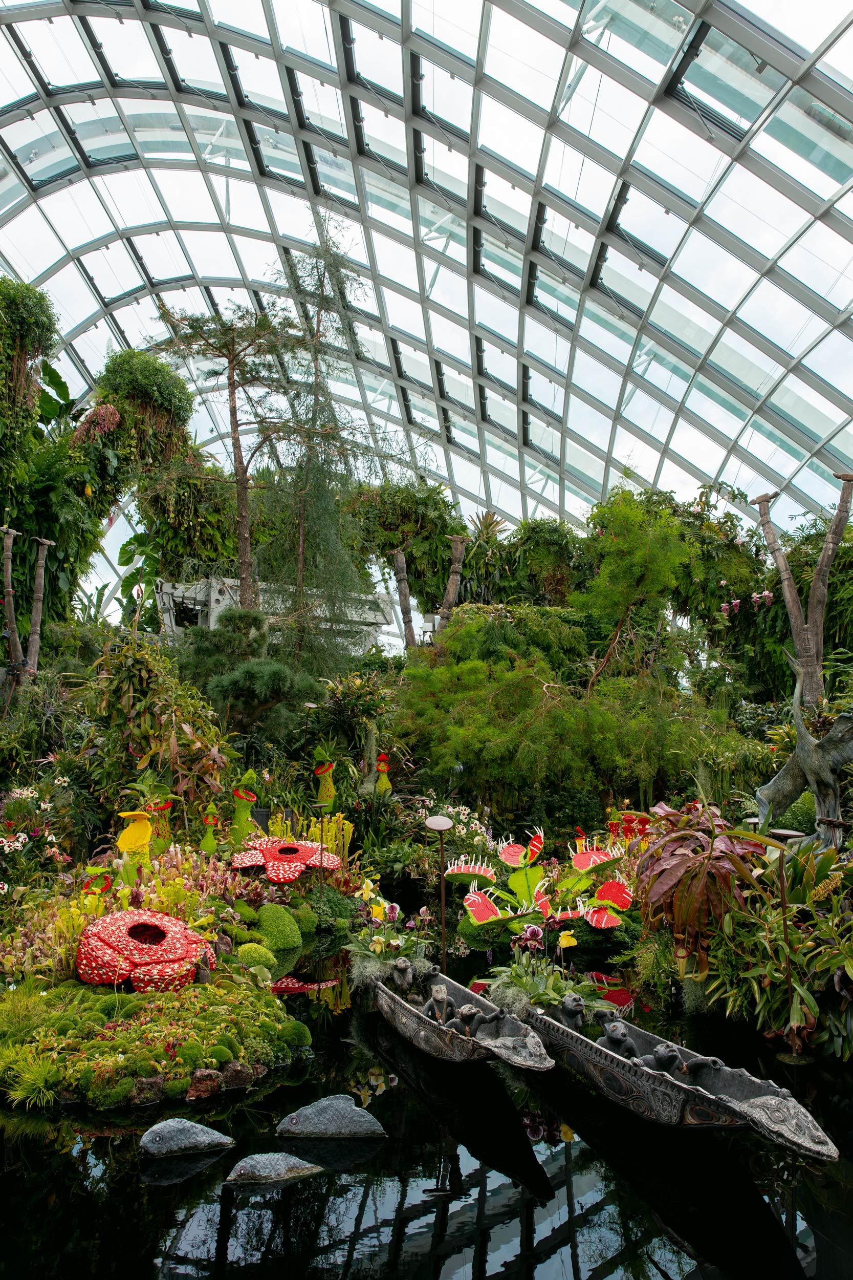 Curved lush green interior Cloud Forest botanical garden Gardens by the Bay Singapore travel editorial photography