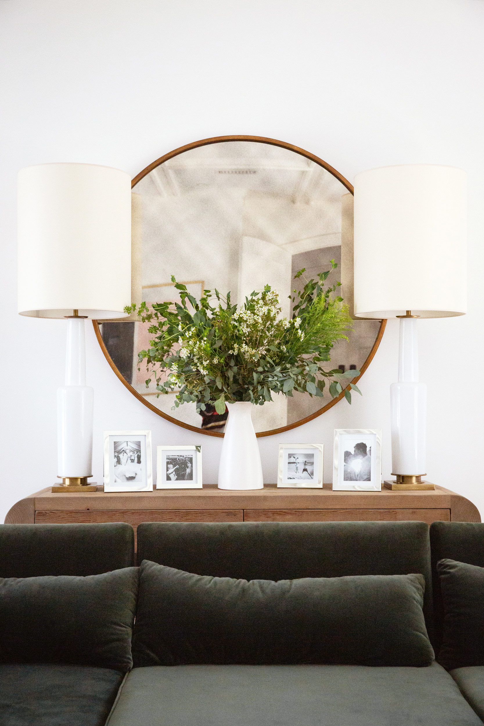Styled console table with round mirror and greenery, interior design lifestyle photography
